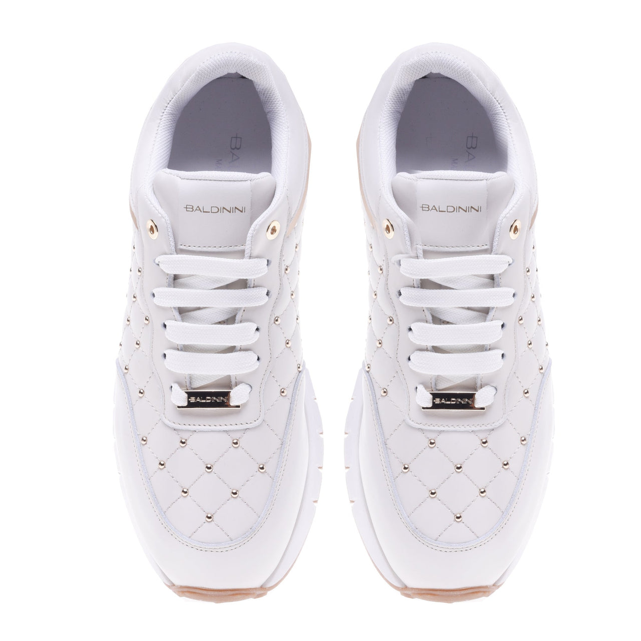 Baldinini Trainers in cream quilted leather im Sale